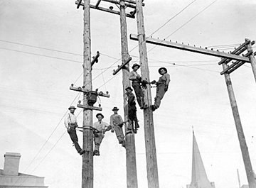 Line crew on poles