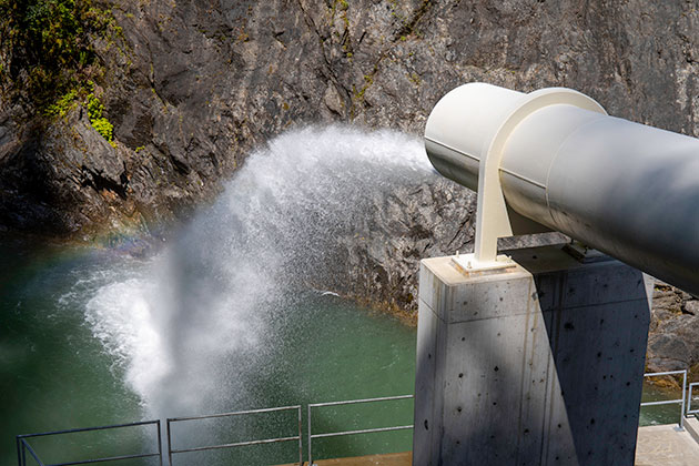 Water flows from the Spada Lake Reservoir into the Sultan River below