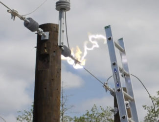 Power line with high voltage arc