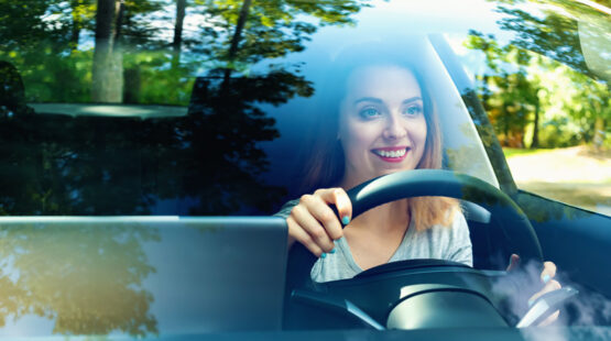 Woman driving electric vehicle