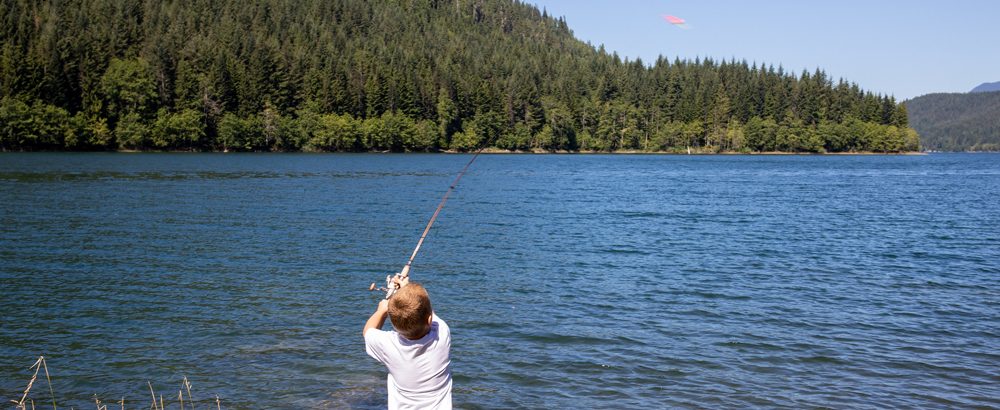 Young person fishing at Spada Lake
