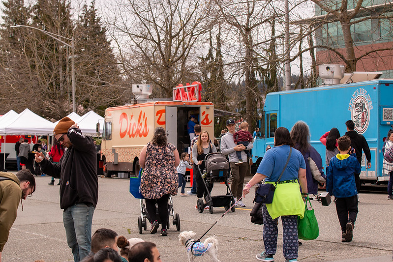 Food Trucks parked along the curb in the shadow of the Electric Building