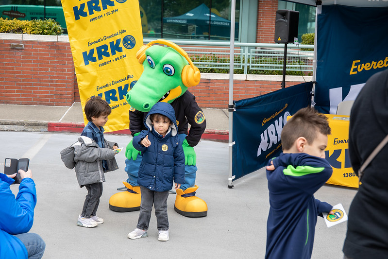 The KRKO crocodile dances with some kids