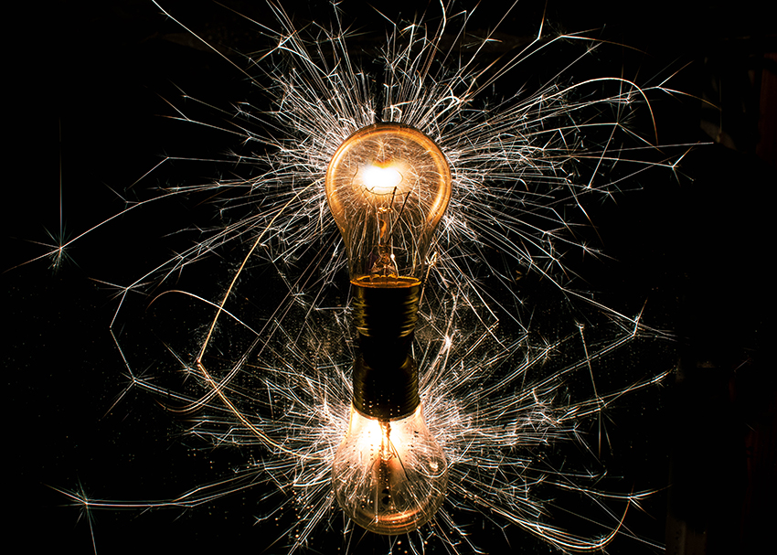 2023 high school photo contest winner - bulb with lines of energy