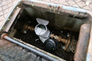 An advanced water meter installed in a meter box