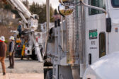 PUD trucks and employees working on reliability improvements