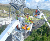 Crew na gumagawa ng aerial work sa Guam