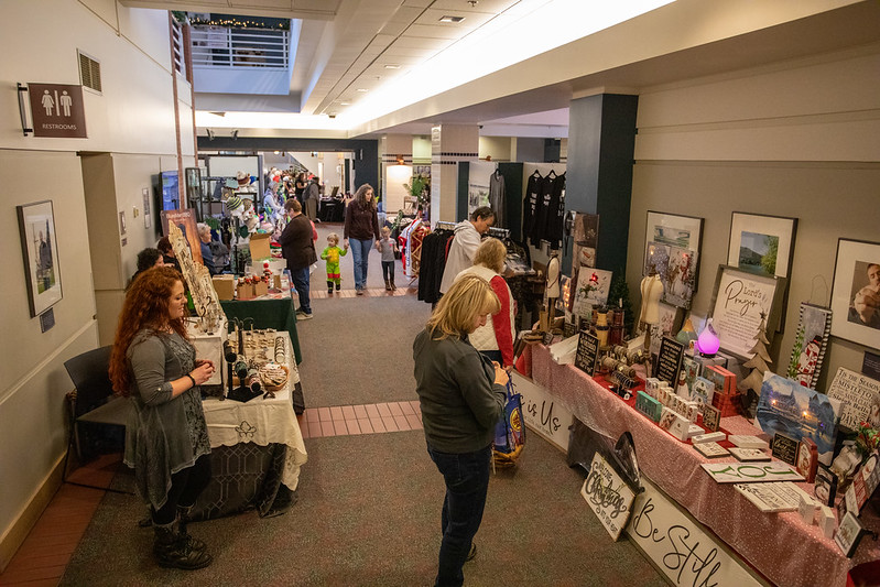 Customers shopping a holiday bazaar