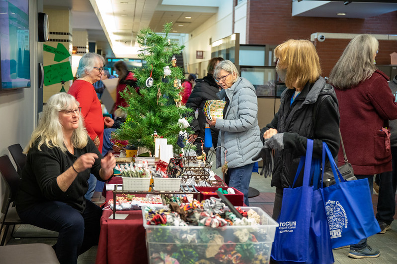 Customers looking at holiday crafts