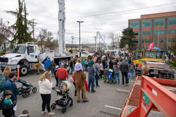 Families enjoy the utility truck show at last year's Energy Block Party