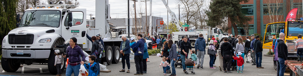 Guests explore a variety of large trucks from the PUD and other community organizations during the Energy Block Party
