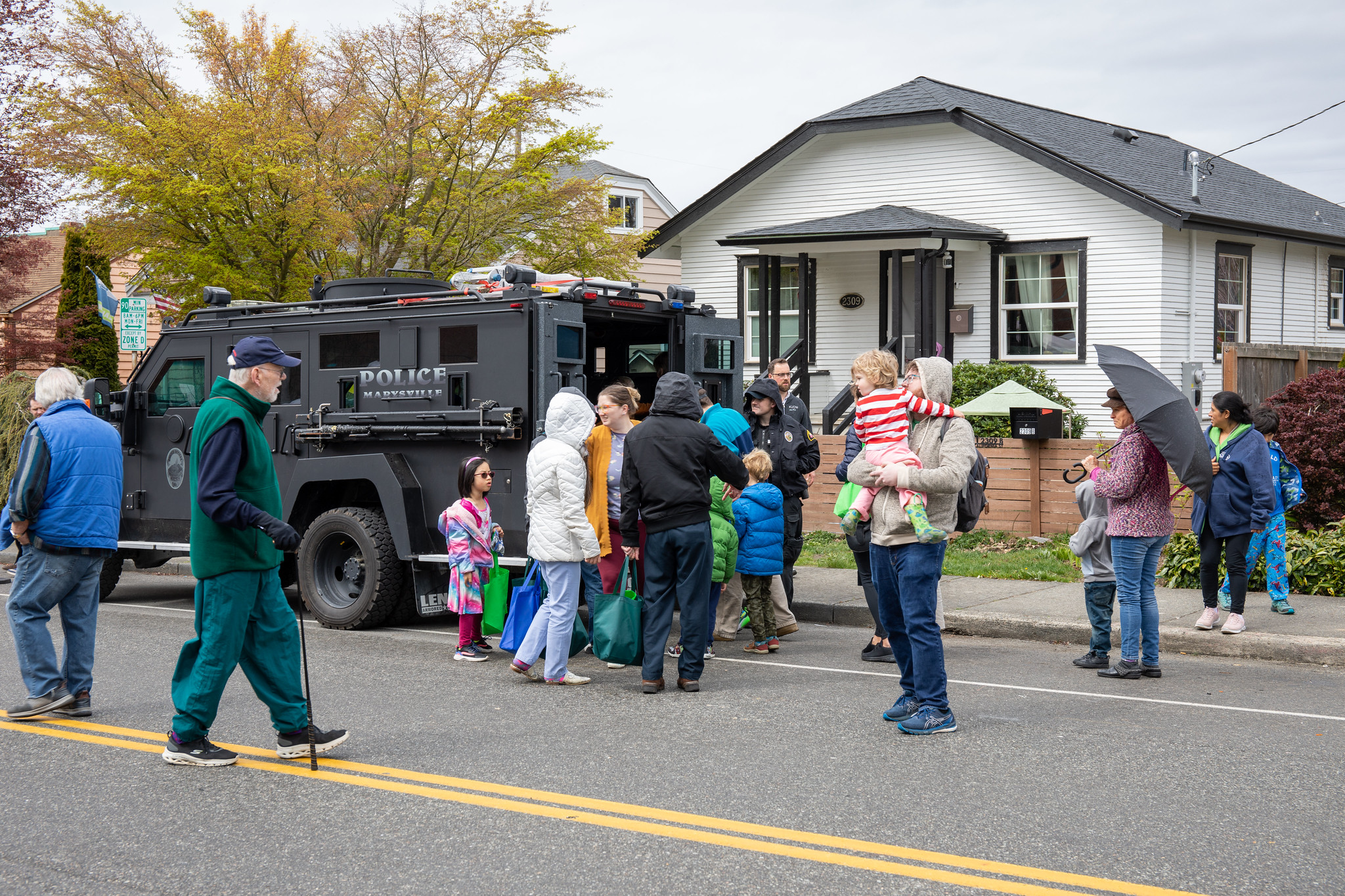 Crowds explore the SWAT vehicle