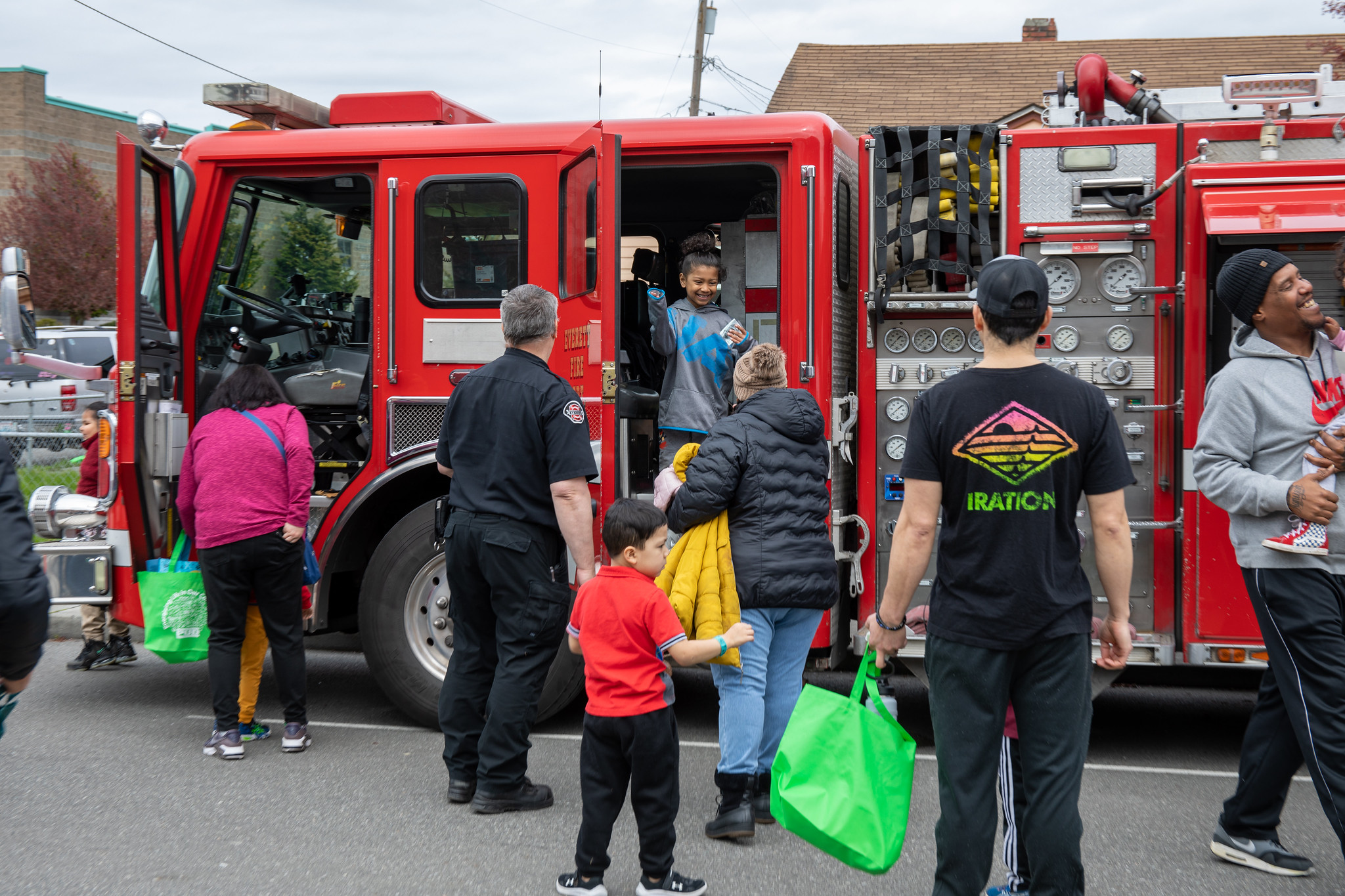 Crowds exploring a fire truck