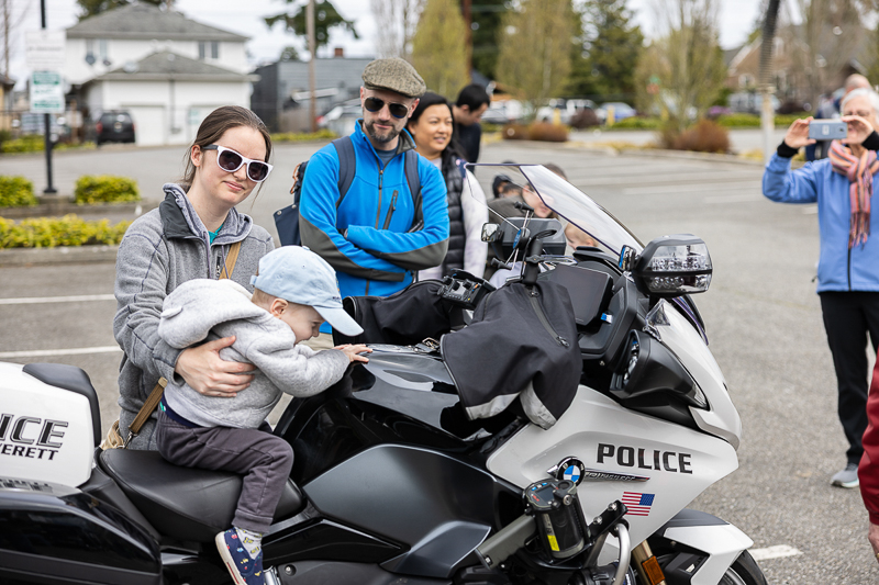 Families check out a police motorcycle