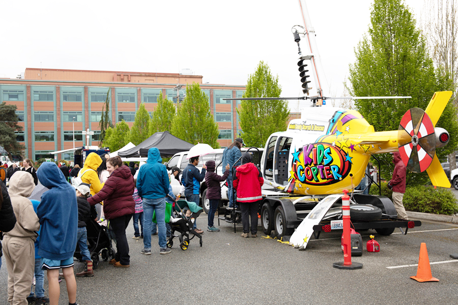 Families gathered around the Snohomish Search and Rescue Kids Copter at the Energy Block Party