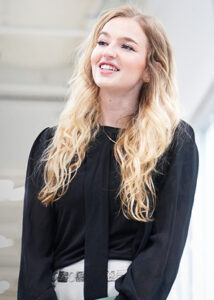 Kyra Jorgensen smiling in black blouse