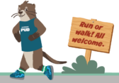 Splash the Otter running on a trail